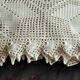 White cotton bedspread, crocheted sofa throw with star patterns