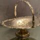 Cut basket basket handle on pedestal in silver metal with floral decoration