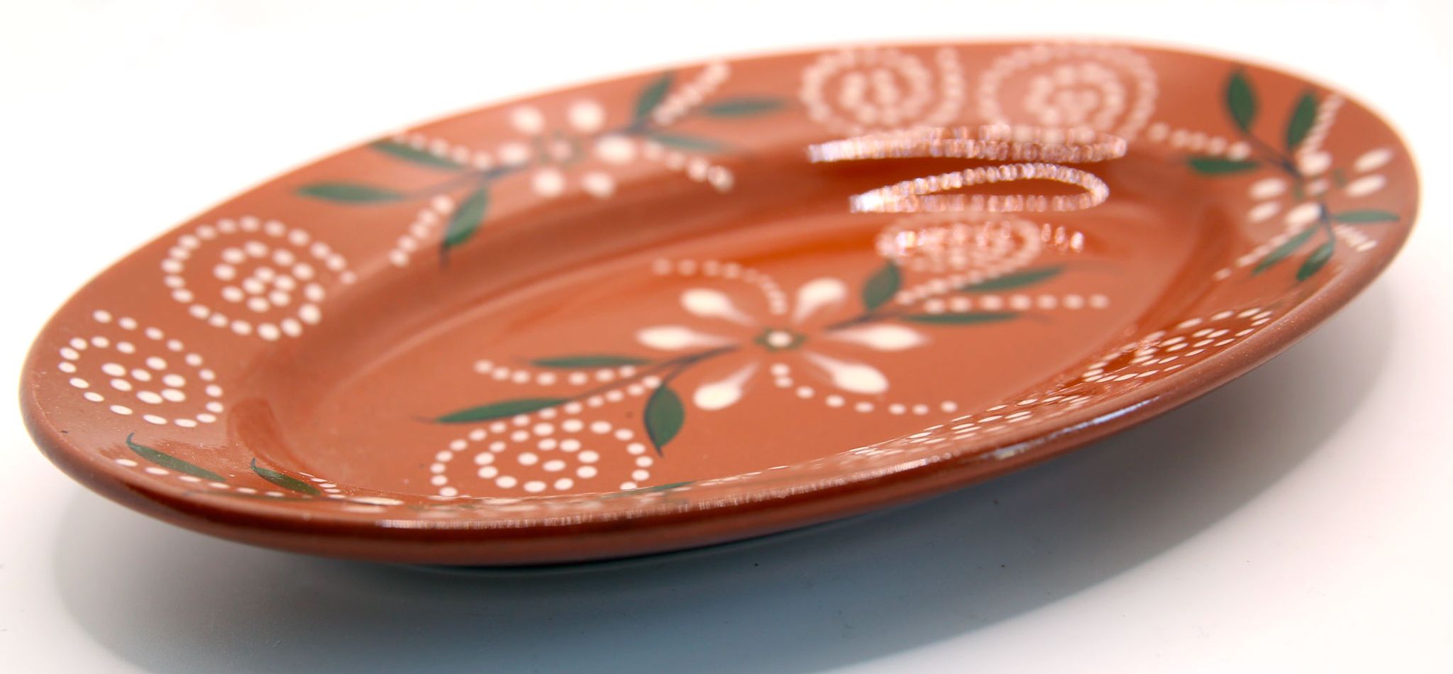 Artisanal oval dish of Portugal in glazed and flowery clay