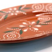 Artisanal oval dish of Portugal in glazed and flowery clay