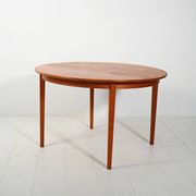 Round extendable teak table by Svante Skogh