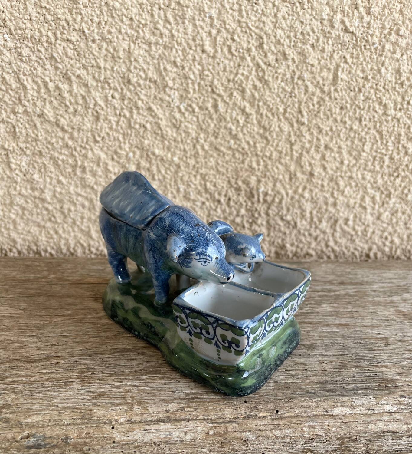Salt cellar and mustard pot in French faience by A Clement.