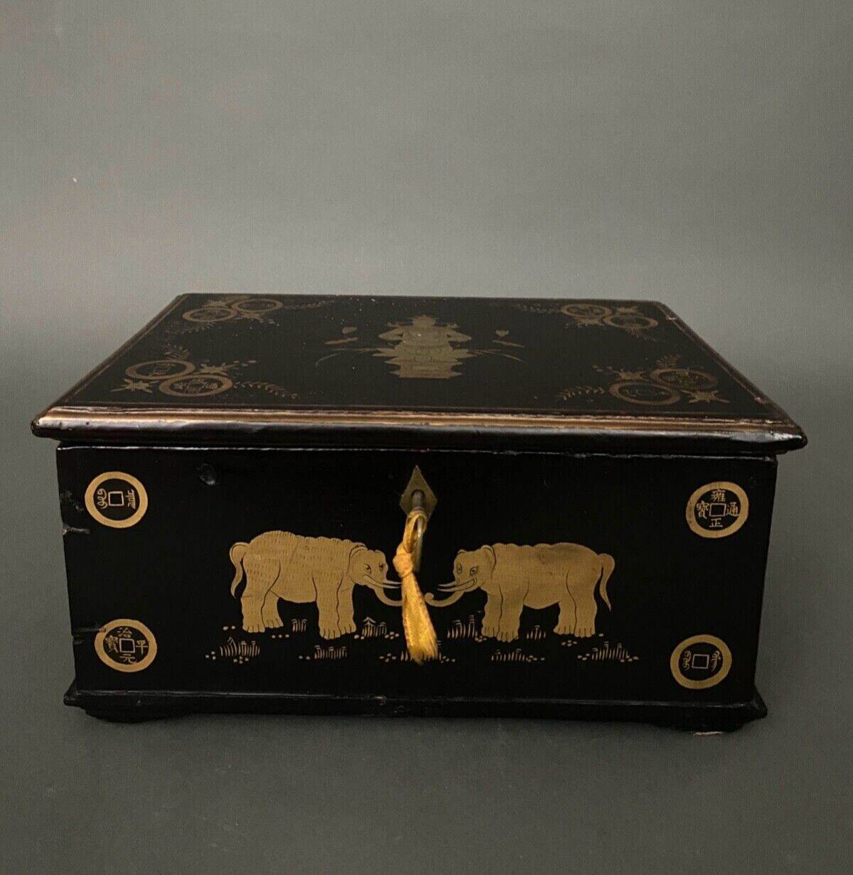 20th century Indian wooden box black lacquer decorated with animals with gold highlights