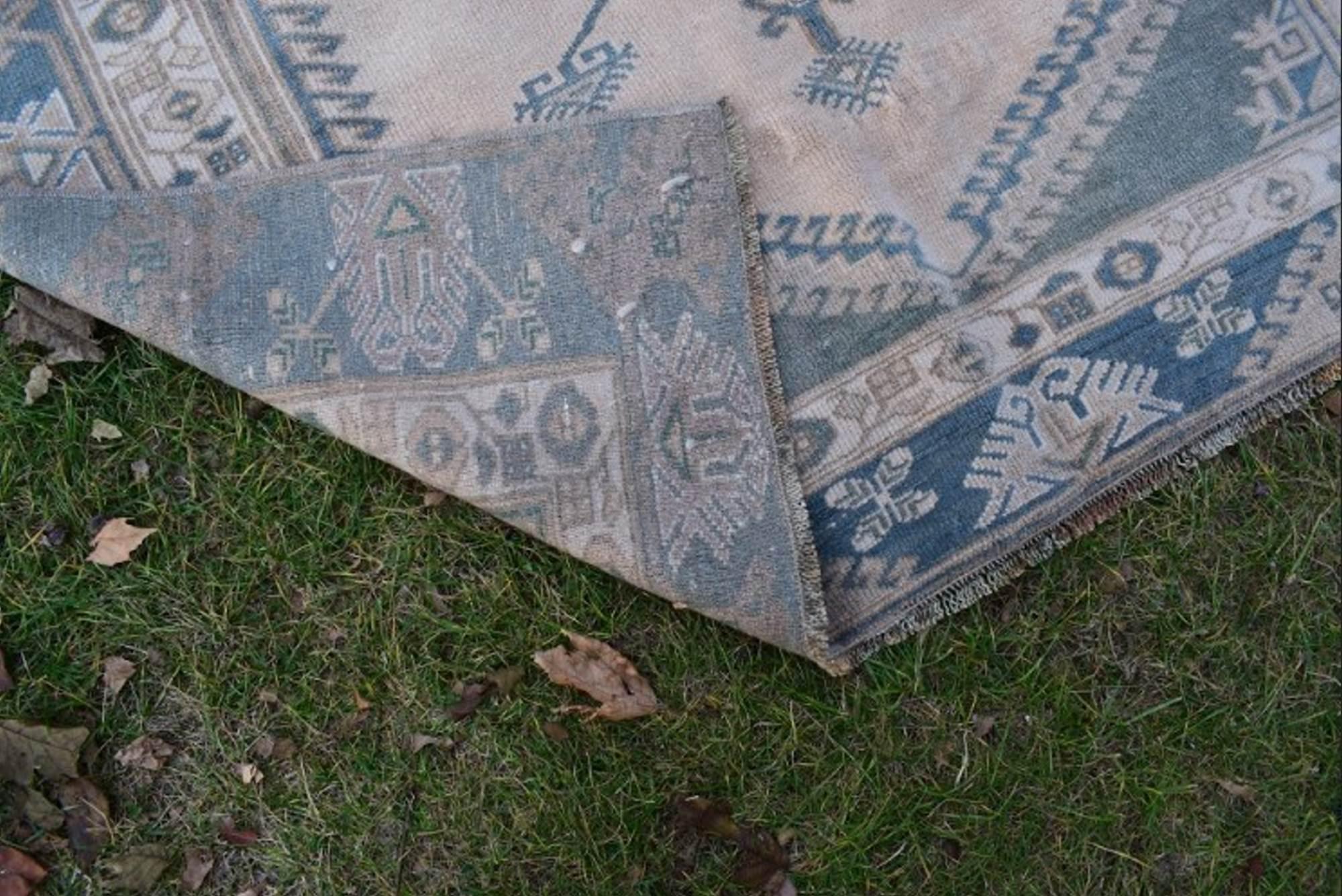 Vintage distressed Turkish Oushak rug 150 x 275 cm