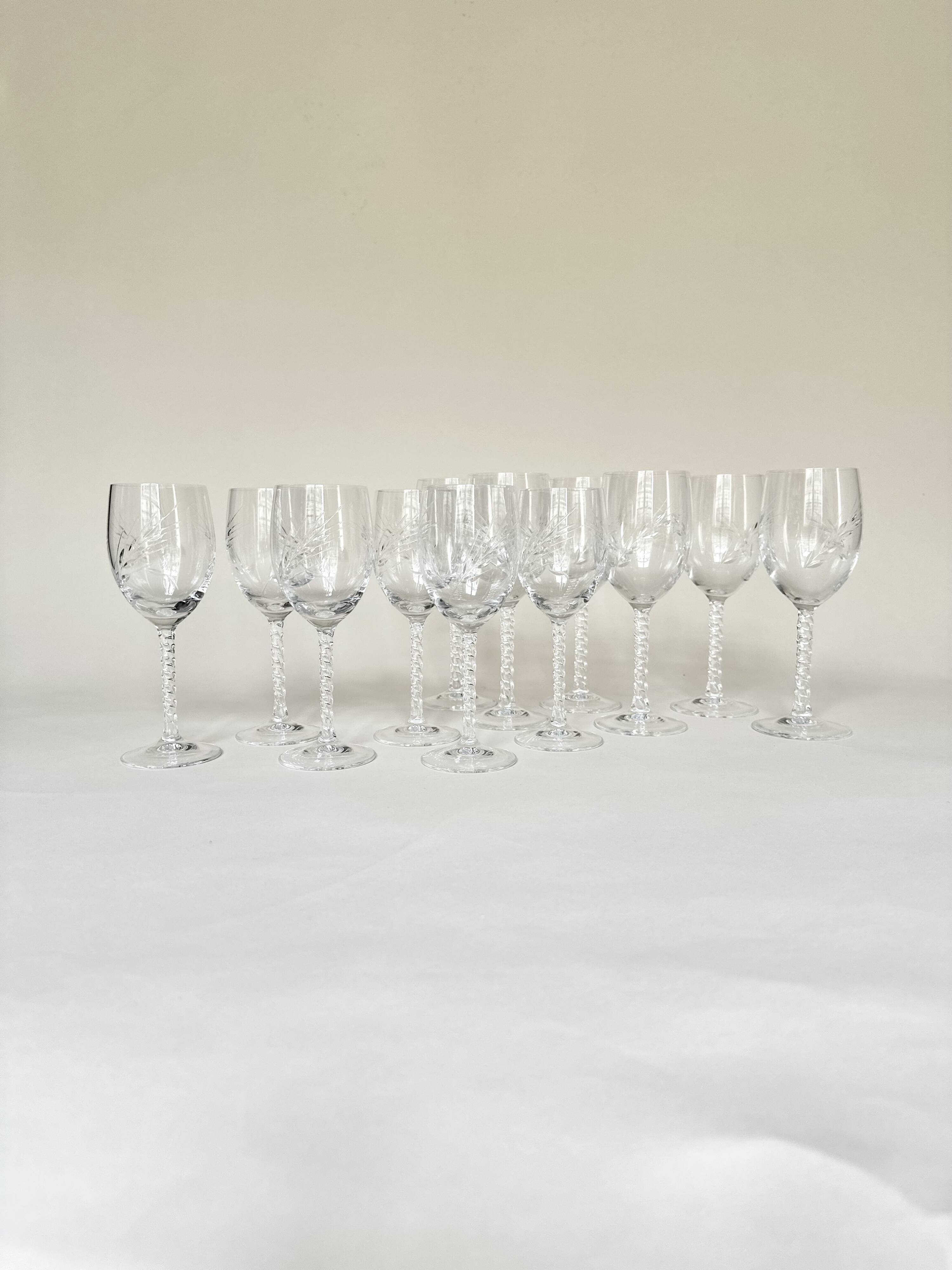 Set of six cut crystal wine glasses and six water glasses.