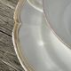 Pair of fine white and gold Limoges porcelain teacups