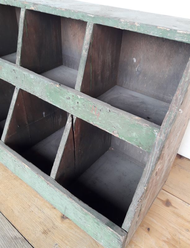 Locker, old workshop shelf in wooden compartments