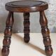 Vintage solid turned wood tripod stool