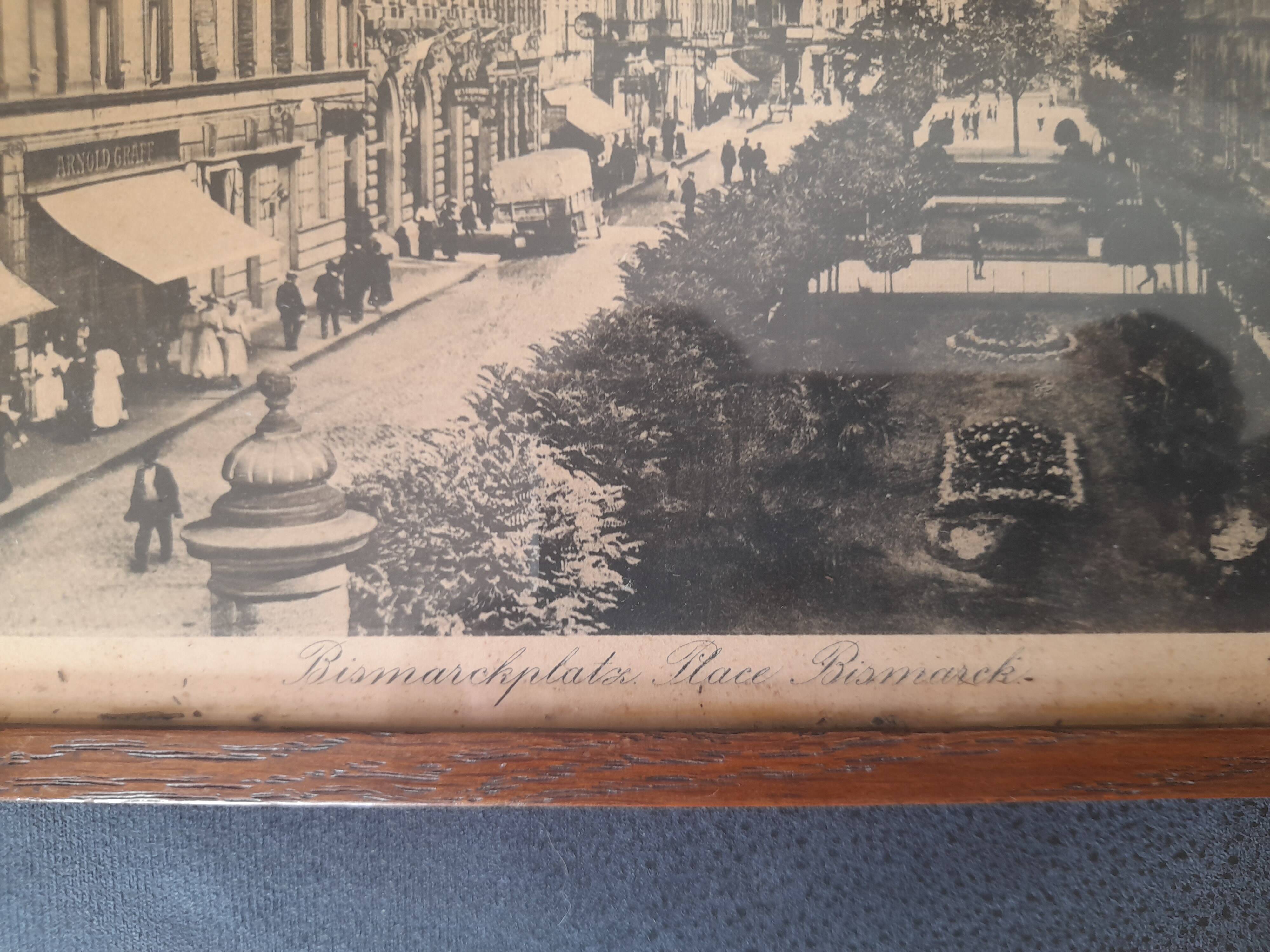 Antique photo frame with reproduction of Bismarck Square - brass corners