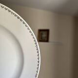 12 white porcelain plates with silver edging