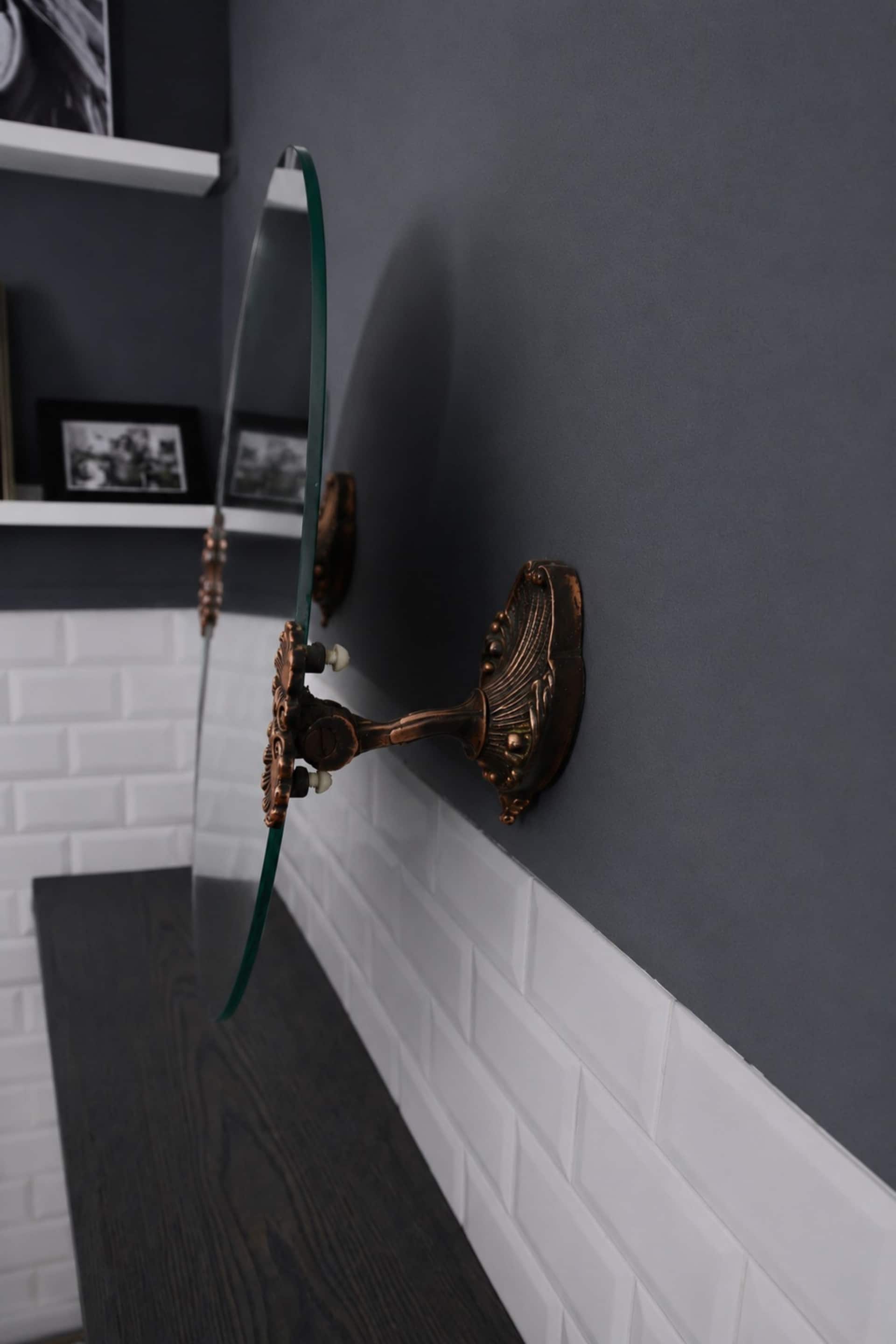 2 round mirrors made of copper alloy, 1940s-1950s