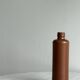 Decorative brown ceramic bottle.