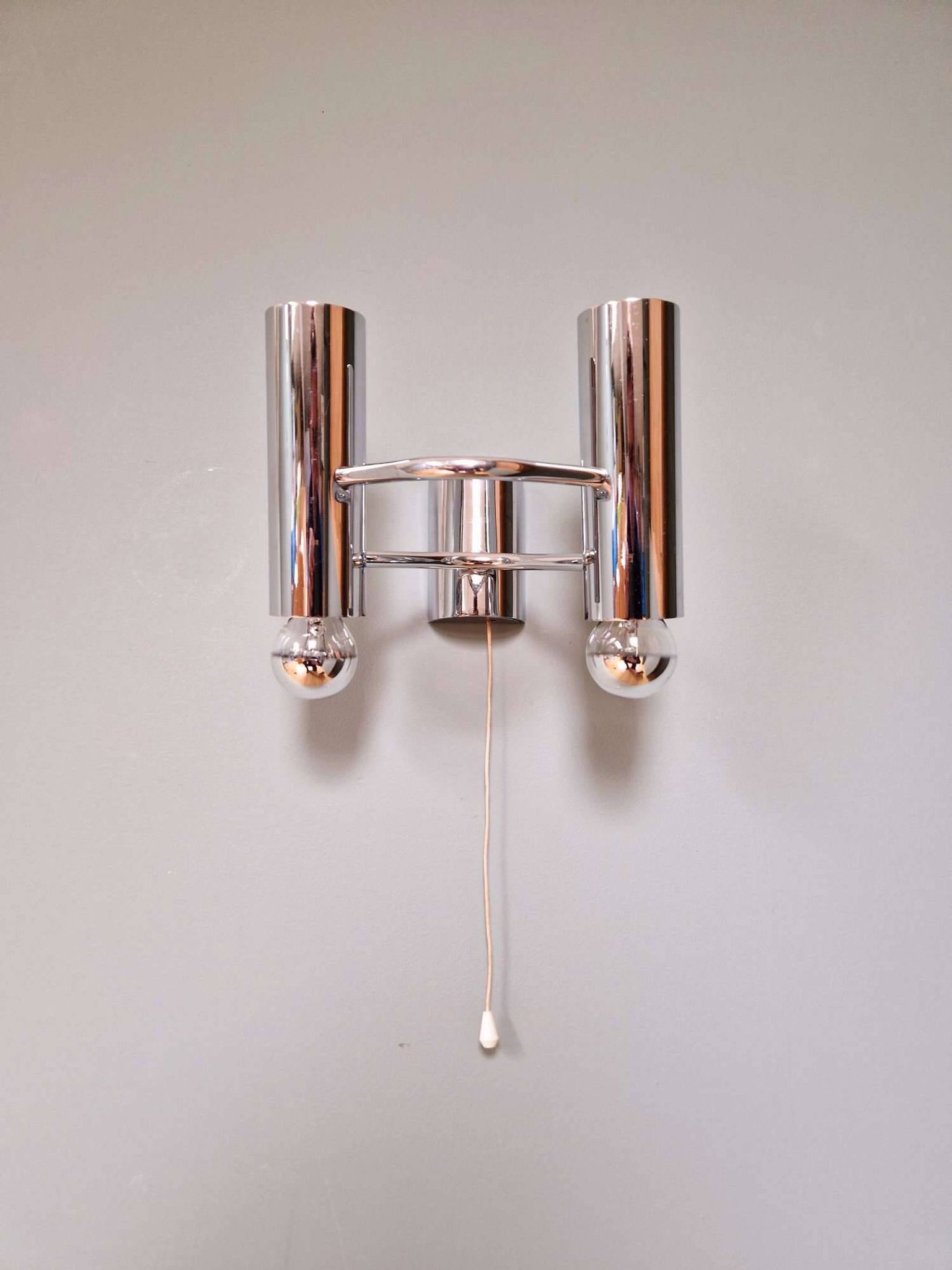 Double wall light in chrome metal, Gaetano Sciolari, 1970.