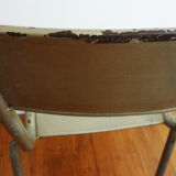 Vintage Mullca 510 chair in metal with a golden bronze sheen