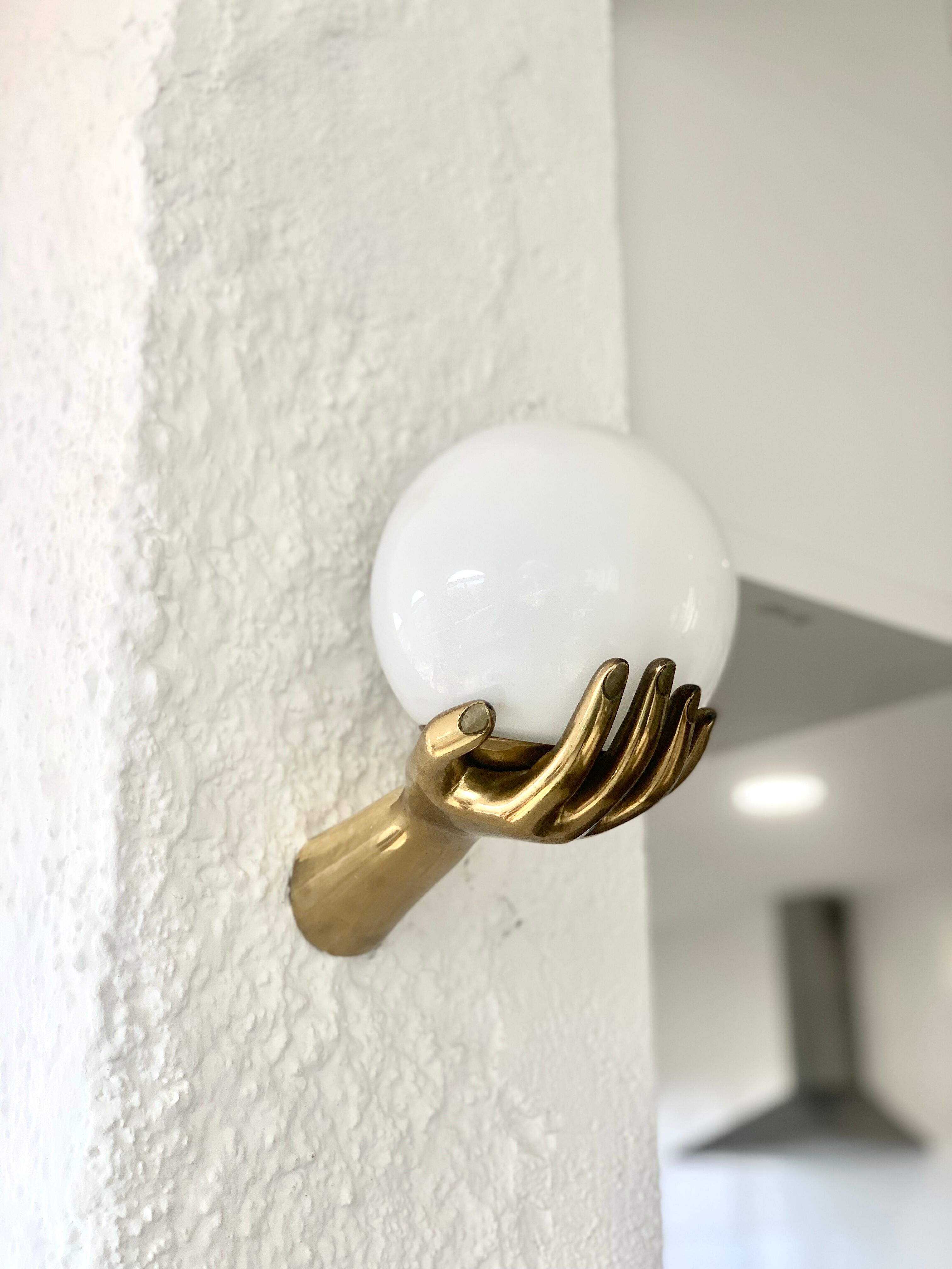 Pair of brass "hands" wall lamps, Arlus 1960