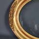 Oval frame nineteenth century gilded stucco wood and glass 36x31 foliage 28x23 cm