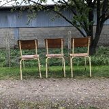 Three vintage school chairs
