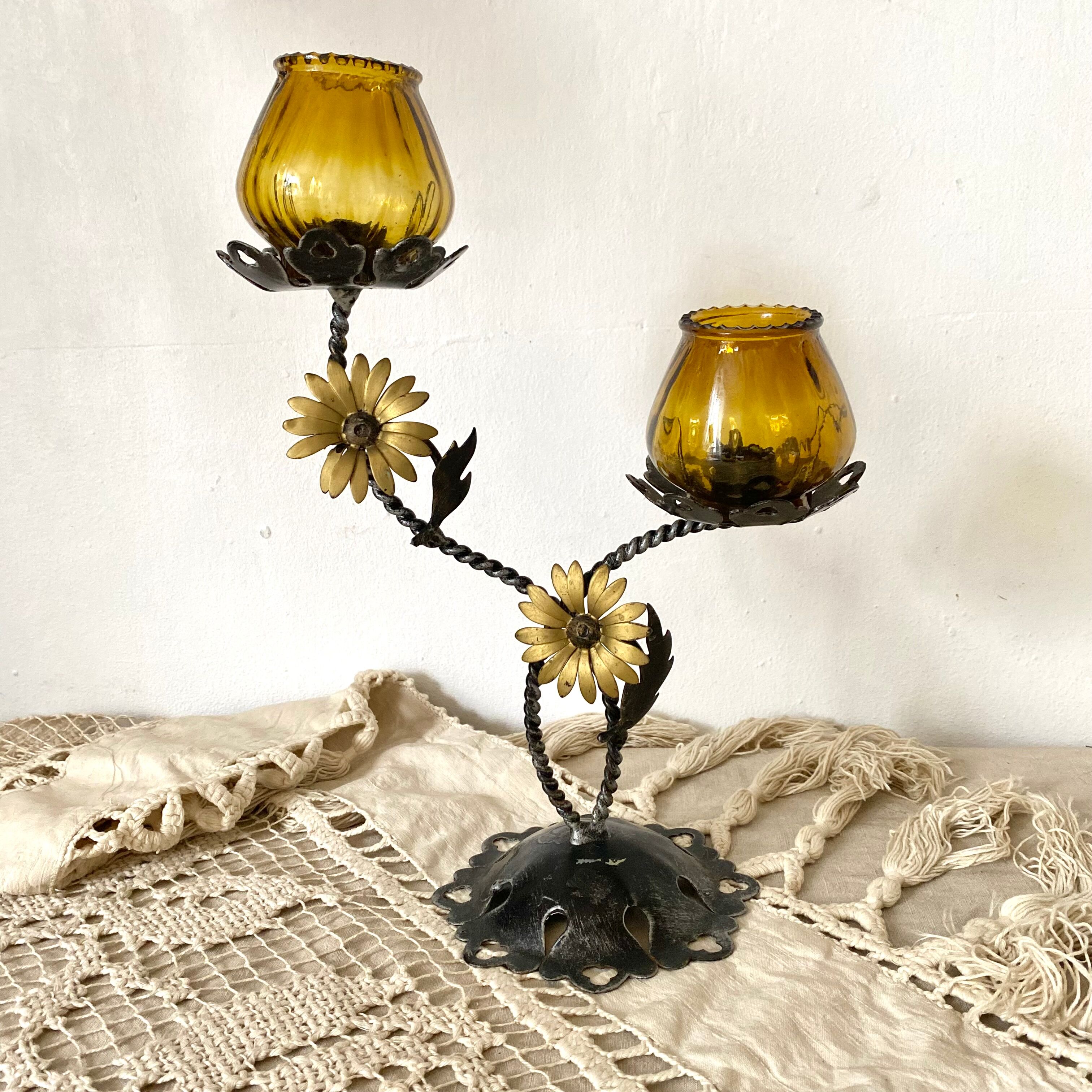 Double candle holder in metal and amber glass
