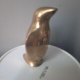 Golden brass penguin