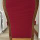 Antique Louis Philippe armchair in walnut and red fabric.