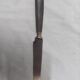 12 ebony handled knives, 1950