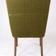 Armchair in birch and orginal dark green fabric of danish design from the 1950