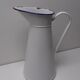 White enamelled broc, blue edé
