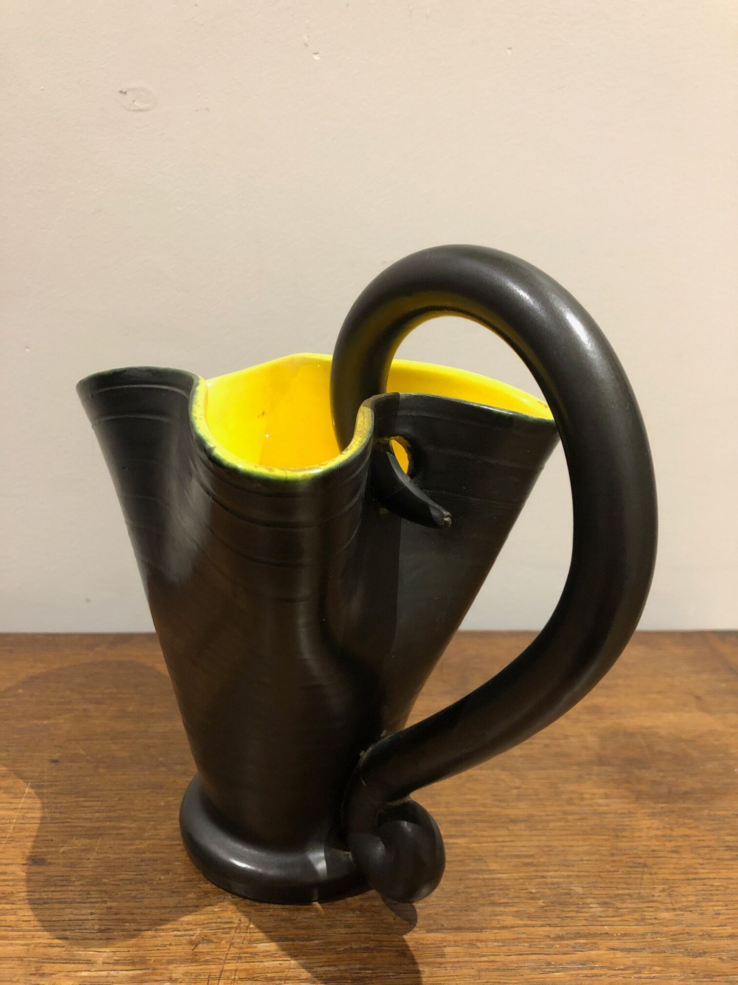 black and yellow vallauris pitcher
