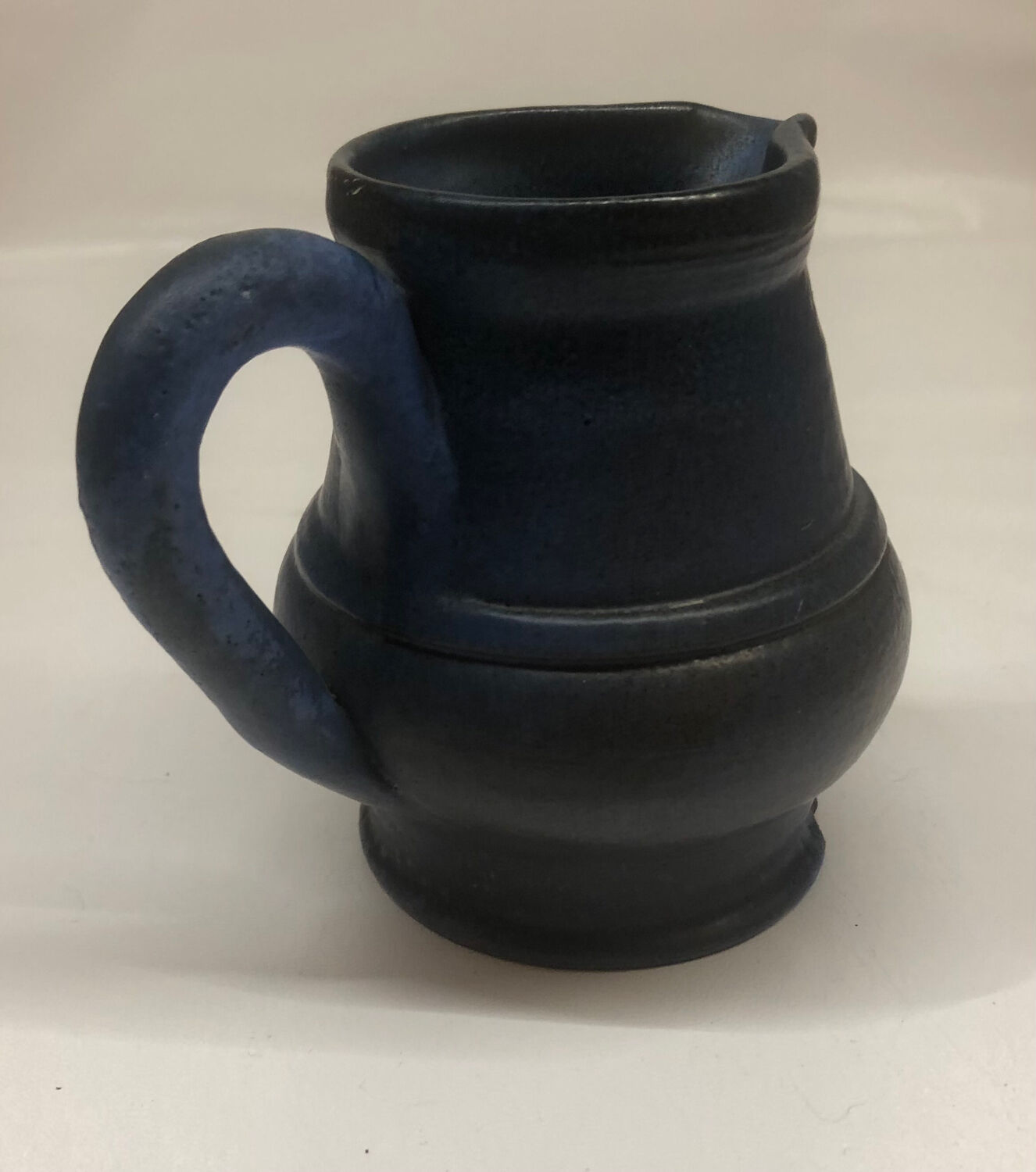 Ceramic pitcher by Roland Tostivint