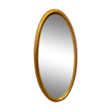 Oval mirror in a frame
