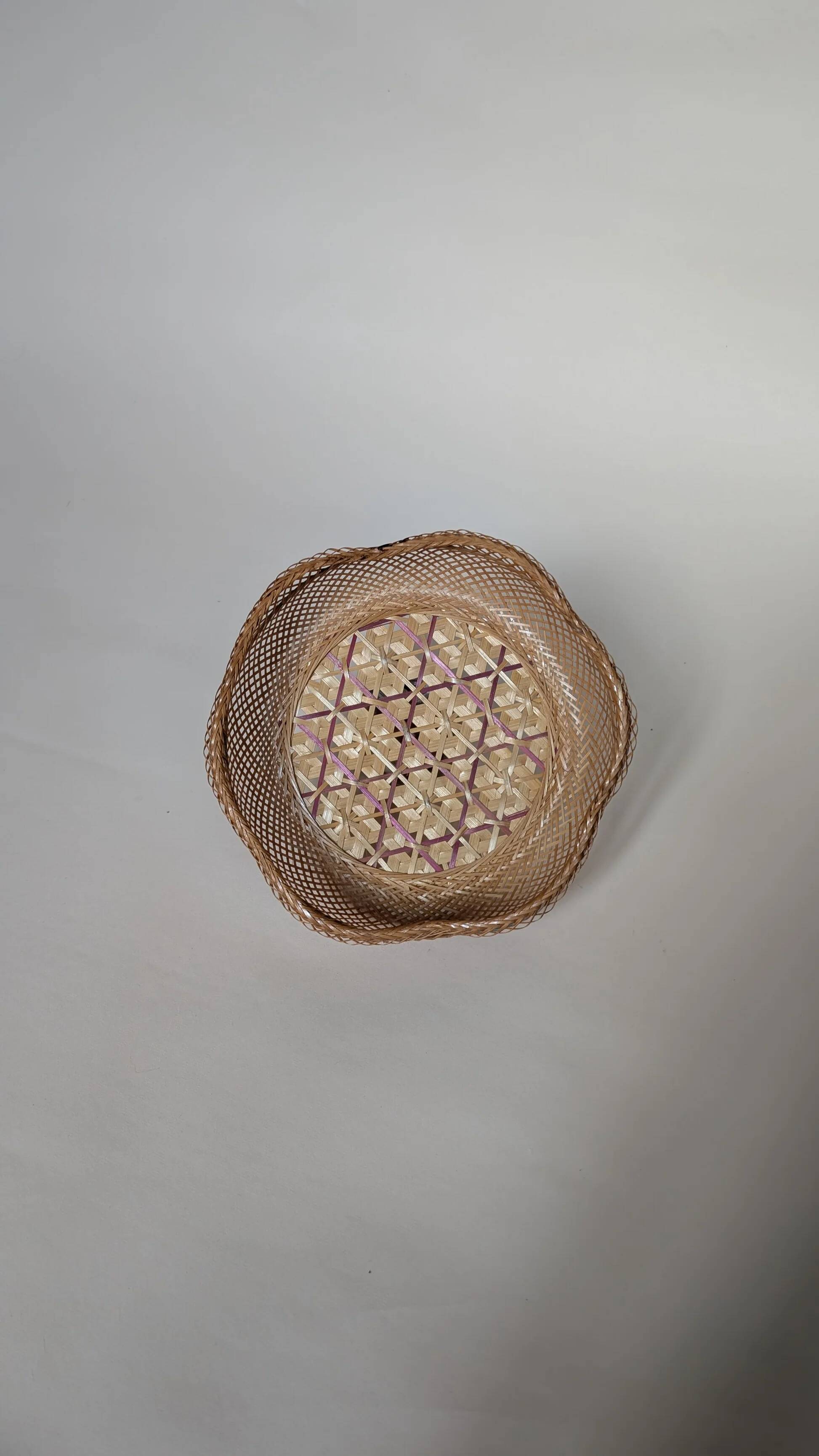 Woven basket made of natural fibre