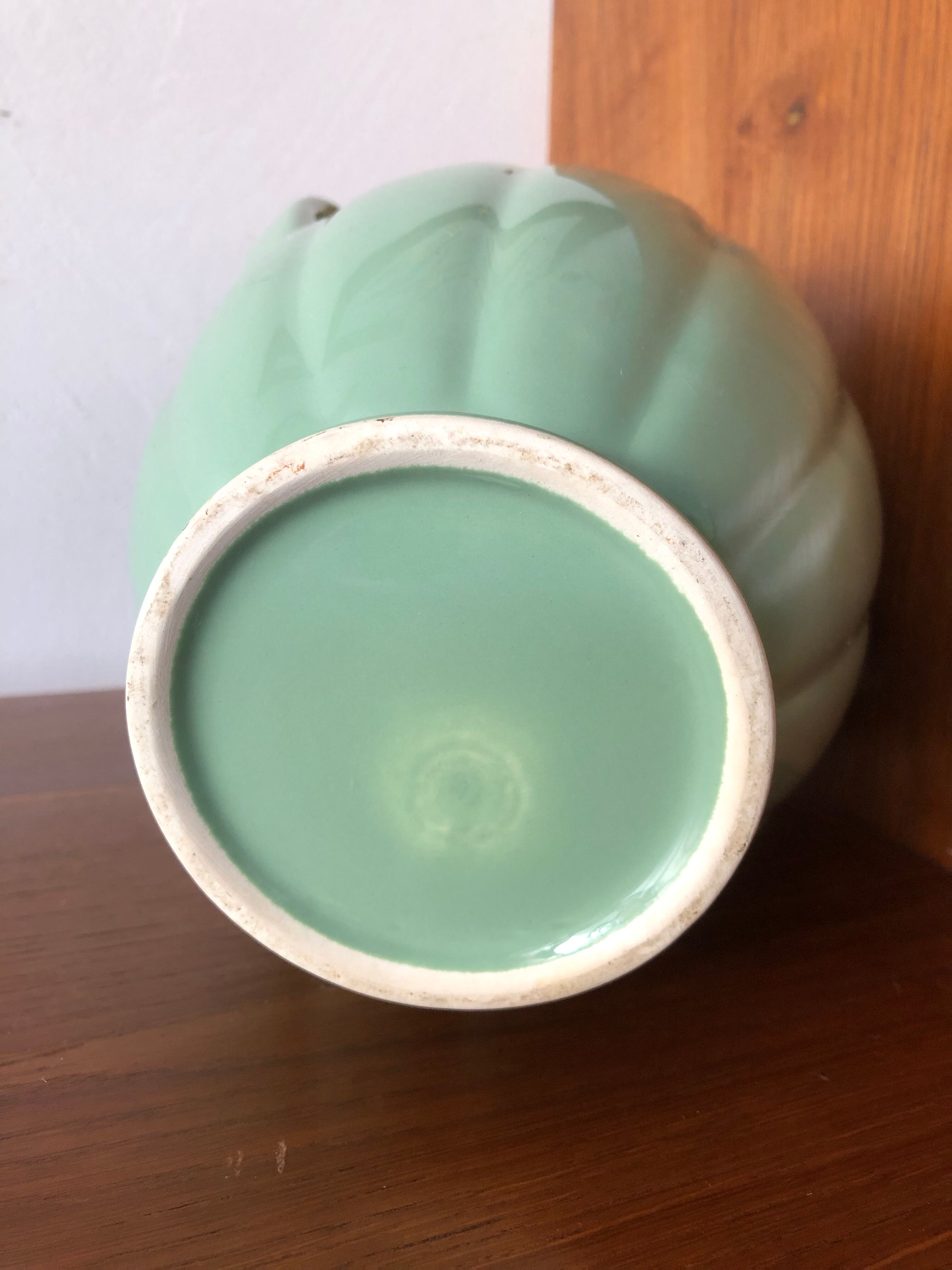 Green vintage water vase