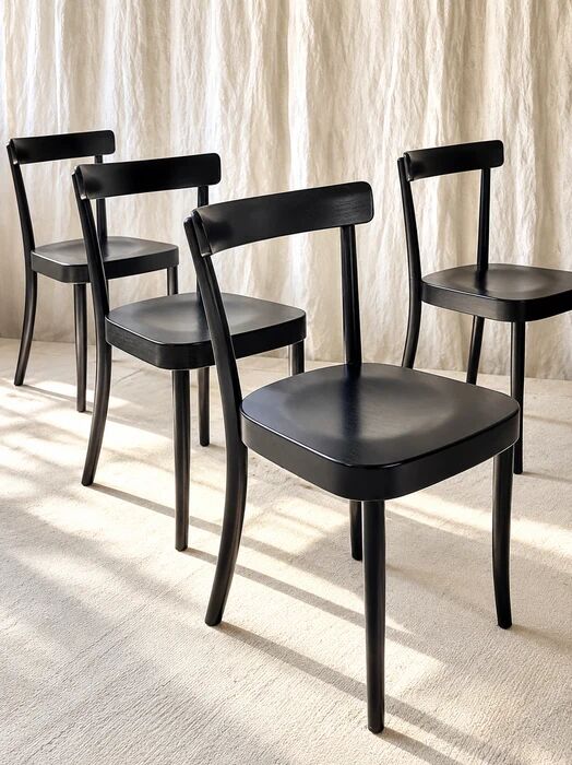 Set of four black Moser 1-250 wooden dining chairs, Werner Max Moser design