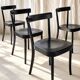 Set of four black Moser 1-250 wooden dining chairs, Werner Max Moser design