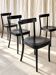 Ensemble de quatre chaises de salle à manger en bois noir Moser 1-250, design de Werner Max Moser.