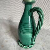 Small green ceramic pitcher