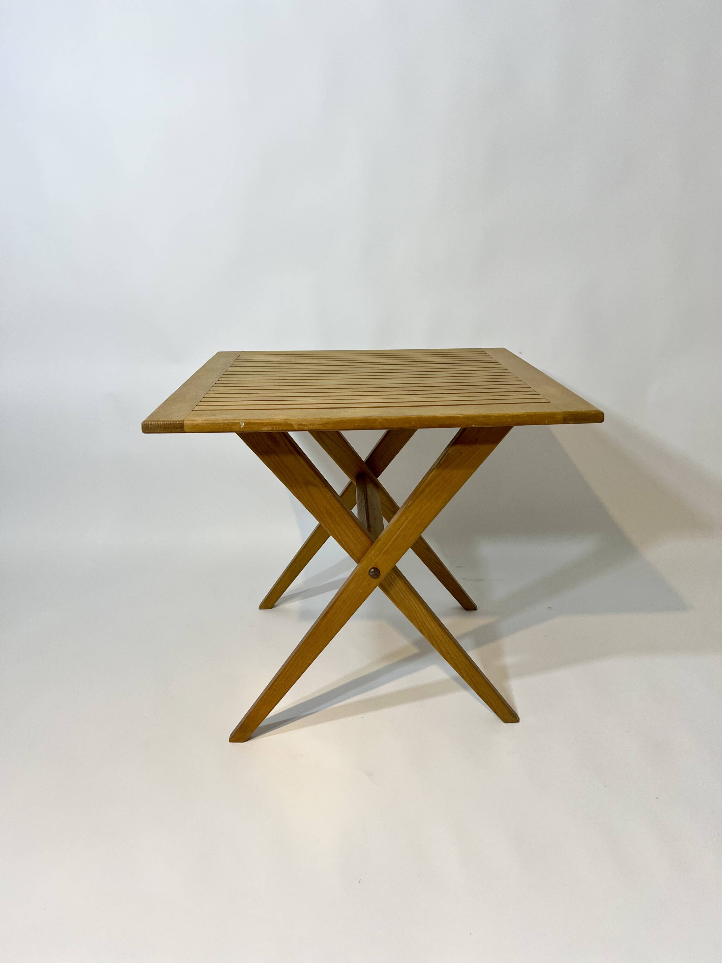 Vintage design solid wood folding scissor table from the 1970s