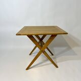 Vintage design solid wood folding scissor table from the 1970s