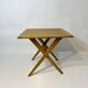 Vintage design solid wood folding scissor table from the 1970s