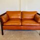 Canapé vintage danois des années 60 en cuir cognac pour 2 personnes.
