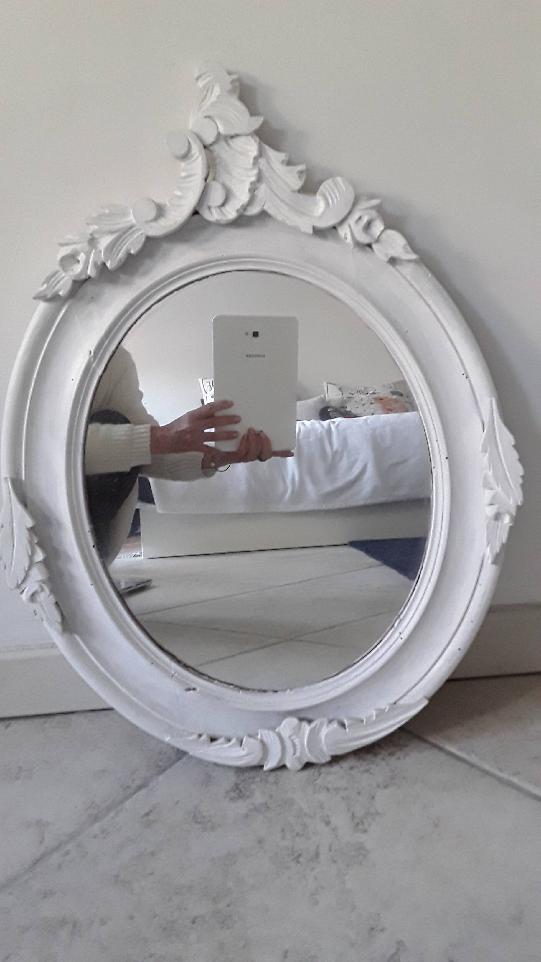 Antique oval mirror in painted wood