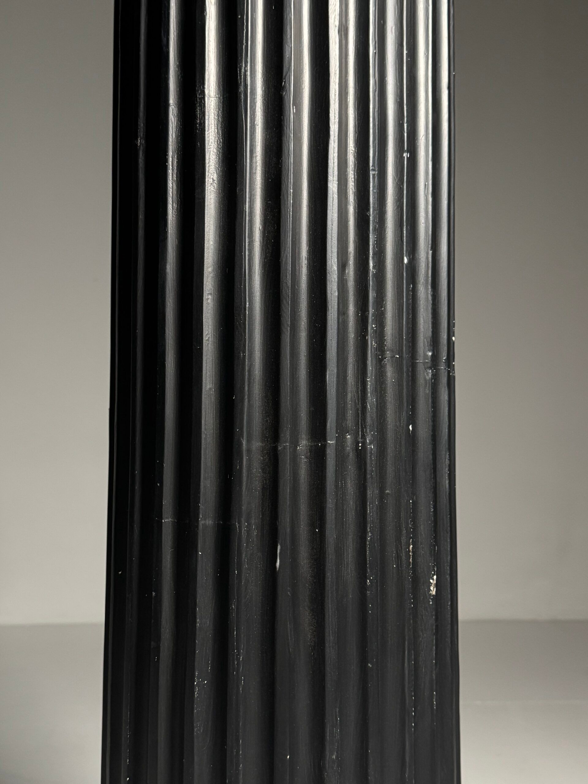 Neoclassical black plaster column
