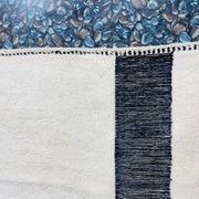 Handmade white and black Berber rug