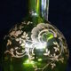 Small carafe and green glass drop glasses with rococo golden emailed decor