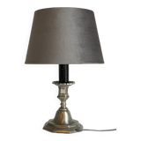 Steel candlestick lamp and grey velvet