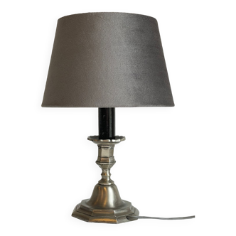 Steel candlestick lamp and grey velvet