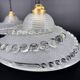 Set of 3 moulded glass pendant lights with cabochons, Art Deco style Ezan.