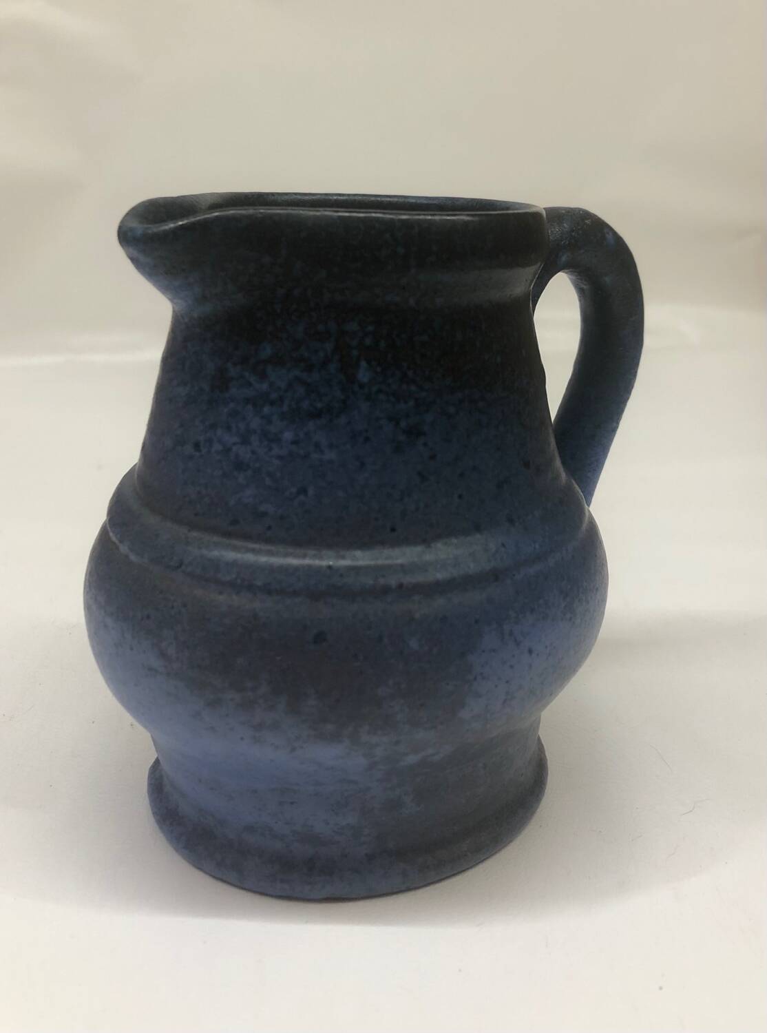 Ceramic pitcher by Roland Tostivint