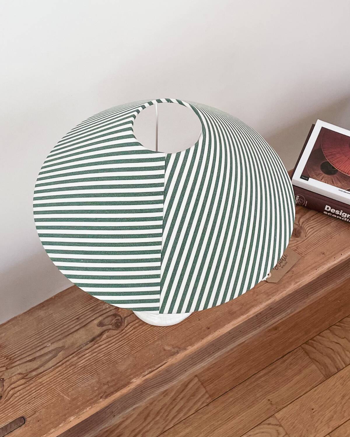 Earthenware lamp and striped lampshade