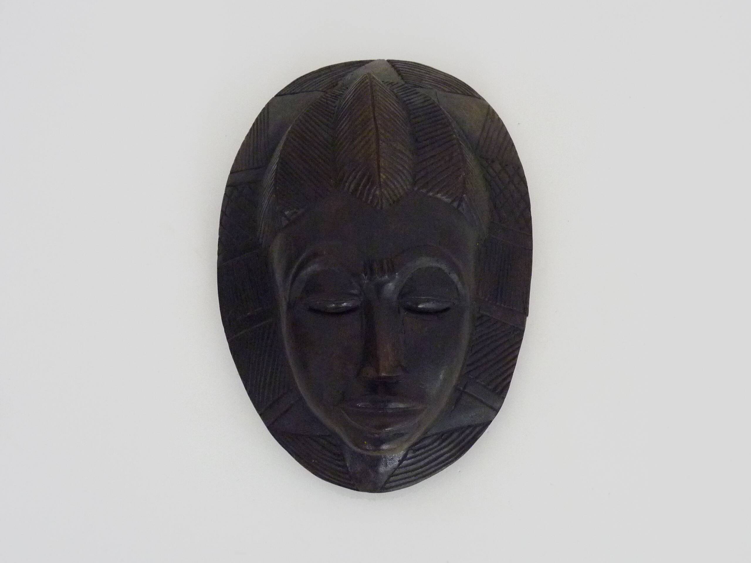 Wooden mask of the Baoulé ethnic group from Ivory Coast. African mask